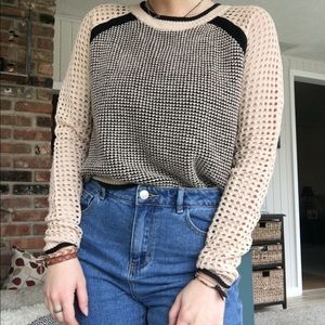 Trendy holey sweater